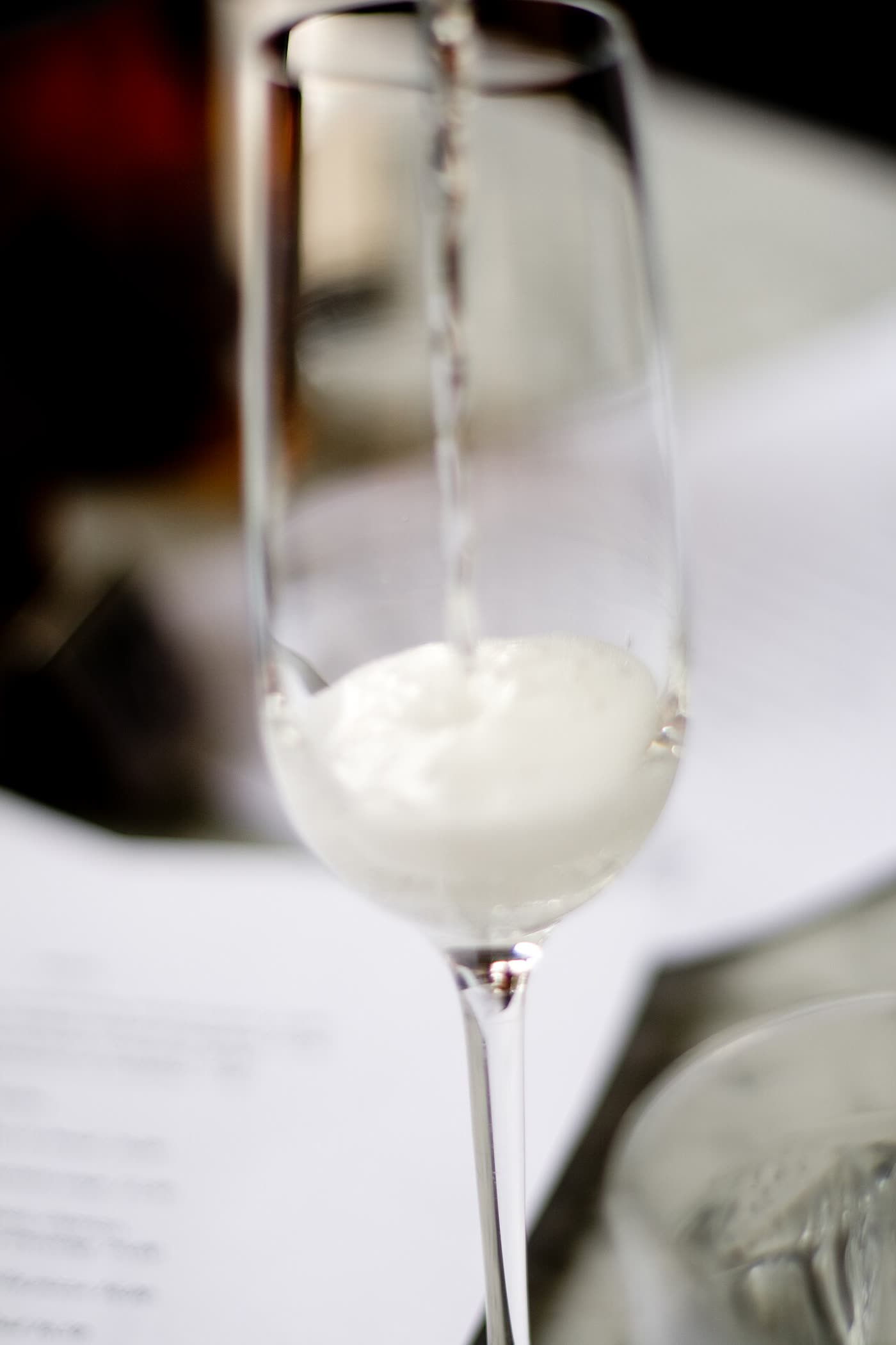 Sparkling wine poured into a flute glass
